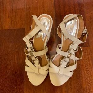 White and silver Marc Fisher sandals.